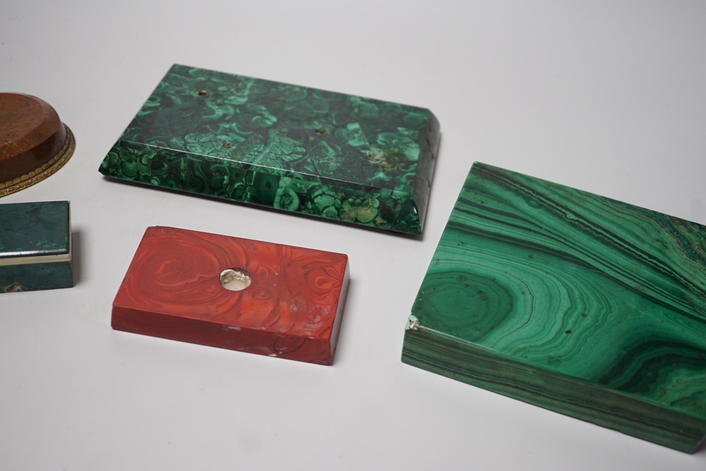 A group of malachite and other hardstone plinths and a small casket